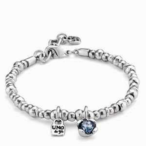 Beaded bracelet with blue crystal